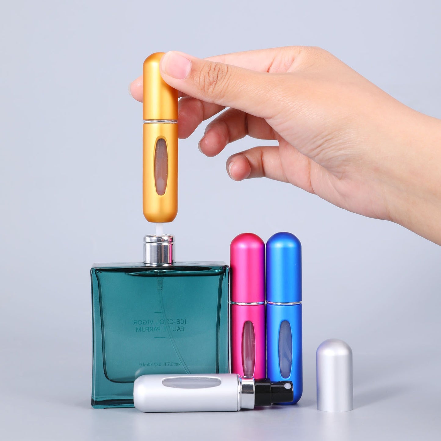Portable Mini Refillable Perfume Bottle With Spray.