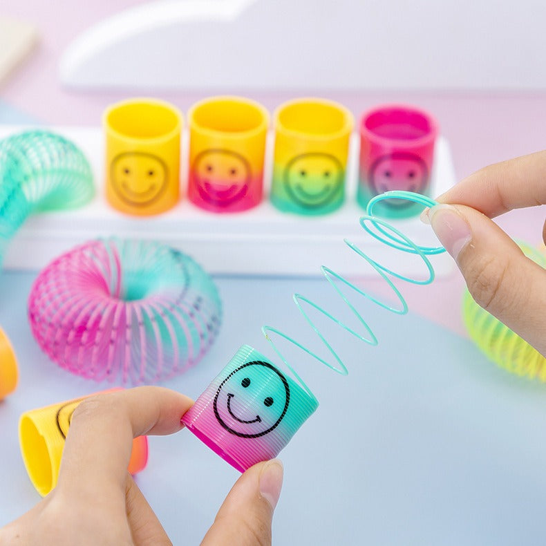 Pack Of 2 - Mini Smiling Face Rainbow Circle Spring Toy