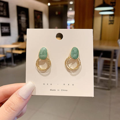 Elegant Emerald Dangle Earrings