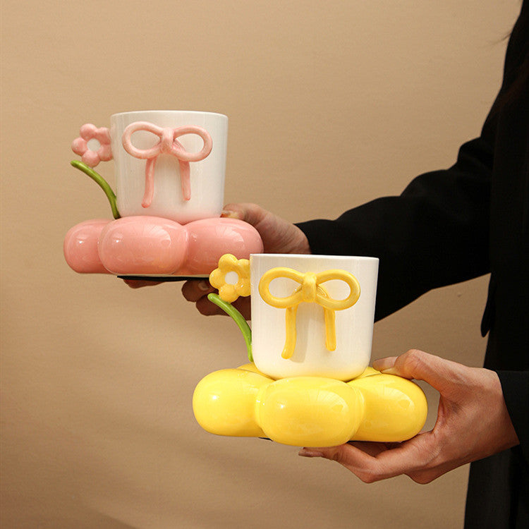 Creative Ceramic Bow Cup with Flower Sausar