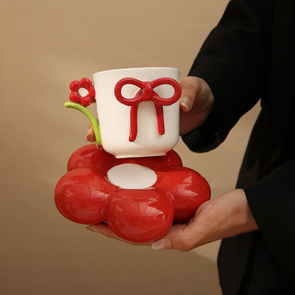 Creative Ceramic Bow Cup with Flower Sausar